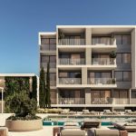 03 Bilding Split-min - Sovereign Estates Sovereign Estates Modern four story apartment building with balconies around a pool and lounge seating in the foreground 2026 Modern four story apartment building with balconies around a pool and lounge seating in the foreground