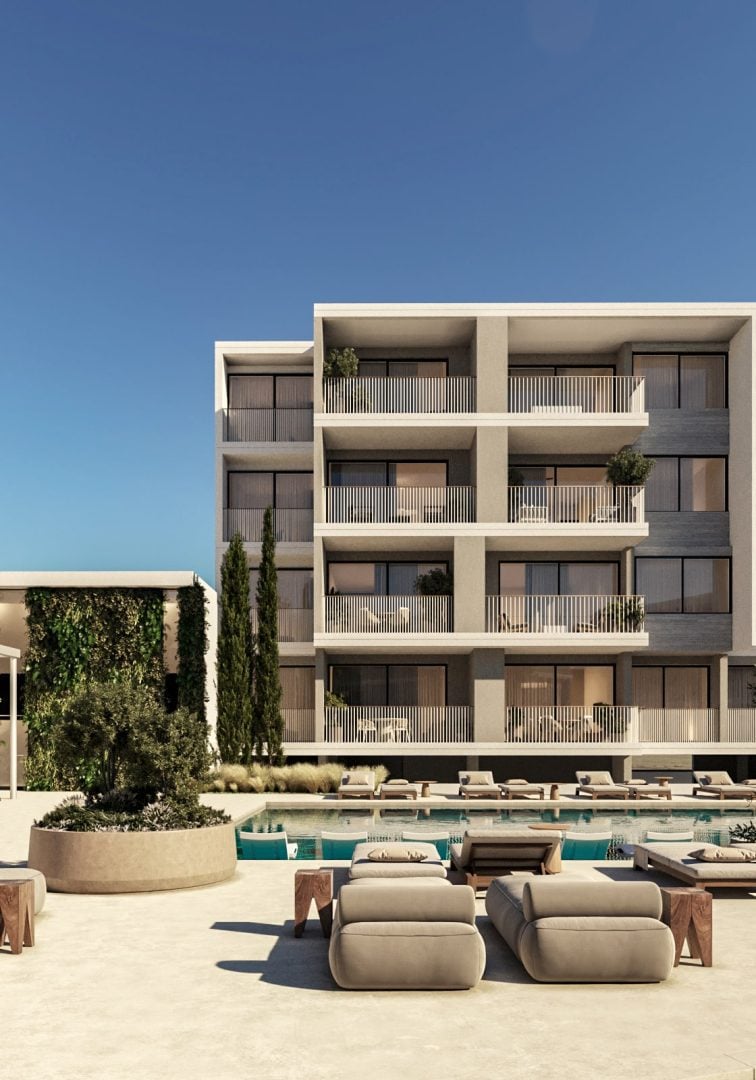 03 Bilding Split-min - Sovereign Estates Sovereign Estates Modern four story apartment building with balconies around a pool and lounge seating in the foreground 2026 Modern four story apartment building with balconies around a pool and lounge seating in the foreground