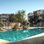 10 Pool Alternative Hero-min - Sovereign Estates Sovereign Estates Luxurious apartment complex courtyard with a large turquoise swimming pool lounge chairs trees and modern multi story buildings 2026 Luxurious apartment complex courtyard with a large turquoise swimming pool lounge chairs trees and modern multi story buildings