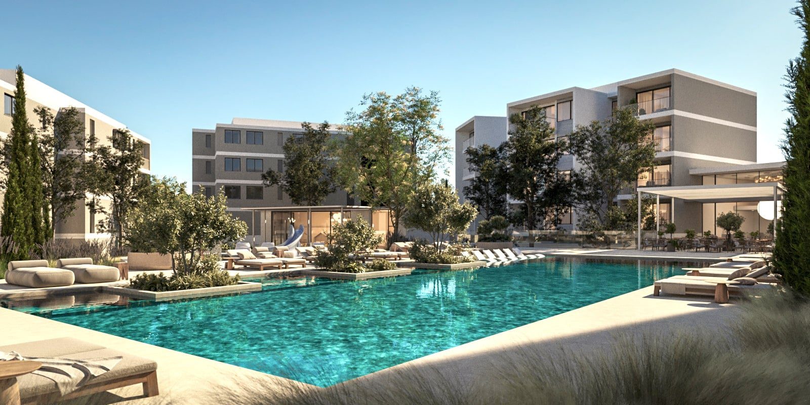 10 Pool Alternative Hero-min - Sovereign Estates Sovereign Estates Luxurious apartment complex courtyard with a large turquoise swimming pool lounge chairs trees and modern multi story buildings 2026 Luxurious apartment complex courtyard with a large turquoise swimming pool lounge chairs trees and modern multi story buildings