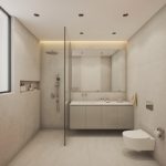 Elysia Blu 1 - Sovereign Estates Sovereign Estates Modern beige tiled bathroom with a glass walled shower double sink vanity large mirror and wall hung toilet 2026 Modern beige tiled bathroom with a glass walled shower double sink vanity large mirror and wall hung toilet