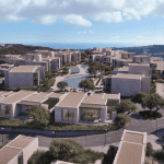 Sovereign Estates   Aerial view of a beige modern villa village with a winding pool and trees sea on the horizon 2026 Aerial view of a beige modern villa village with a winding pool and trees sea on the horizon