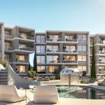 Sovereign Estates   Modern apartment courtyard with a central pool a curved slide and lounge chairs amid glass fronted buildings 2026 Modern apartment courtyard with a central pool a curved slide and lounge chairs amid glass fronted buildings