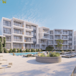 4 - Sovereign Estates Sovereign Estates Modern apartment complex with a bright outdoor pool area and lounge chairs in the foreground several balconies visible on white gray buildings under a clear blue sky 2026 Modern apartment complex with a bright outdoor pool area and lounge chairs in the foreground several balconies visible on white gray buildings under a clear blue sky