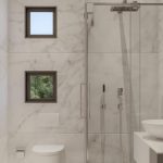 Sovereign Estates   Marble bathroom with a glass shower enclosure wall mounted toilet and a white vessel sink on a vanity 2026 Marble bathroom with a glass shower enclosure wall mounted toilet and a white vessel sink on a vanity