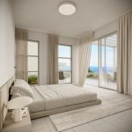 Sovereign Estates   Minimalist bedroom with a low platform bed white bedding and floor to ceiling glass doors overlooking the sea via a balcony 2026 Minimalist bedroom with a low platform bed white bedding and floor to ceiling glass doors overlooking the sea via a balcony