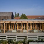 Sovereign Estates   Outdoor dining terrace with a wooden pergola over glass walled restaurant on a concrete structure under a clear blue sky 2026 Outdoor dining terrace with a wooden pergola over glass walled restaurant on a concrete structure under a clear blue sky