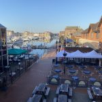 Sovereign Estates   Marina lined with boats and calm water outdoor seating under white canopies on a brick paved promenade 2026 Marina lined with boats and calm water outdoor seating under white canopies on a brick paved promenade