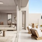 Sovereign Estates   Open plan living room with beige sofas marble kitchen and glass doors leading to a sunny outdoor lounge by a pool with sea view 2026 Open plan living room with beige sofas marble kitchen and glass doors leading to a sunny outdoor lounge by a pool with sea view