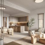 Sovereign Estates   Open plan living area with a beige sofa round wood coffee table and a modern kitchen island in neutral tones 2026 Open plan living area with a beige sofa round wood coffee table and a modern kitchen island in neutral tones
