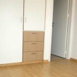 Sovereign Estates   Room with light wood floor built in white wardrobe and three wooden drawers open door to hallwayadjacent space 2026 Room with light wood floor built in white wardrobe and three wooden drawers open door to hallwayadjacent space