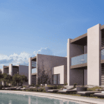 Sovereign Estates   Modern villa style residences with glass balconies beside a rectangular pool and sun loungers under a blue sky 2026 Modern villa style residences with glass balconies beside a rectangular pool and sun loungers under a blue sky